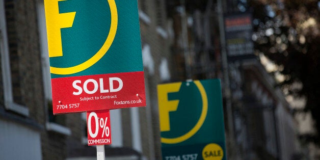 A Foxtons estate agents sign advertises a residential property as 'Sold' in the Brixton district of London, U.K., on Monday, May 13, 2013. BC Partners Ltd., owner of real estate broker Foxtons Ltd., plans to appoint bankers this month to look at options for the company, Sky News reported, citing people familiar with the matter. Photographer: Simon Dawson/Bloomberg via Getty Images