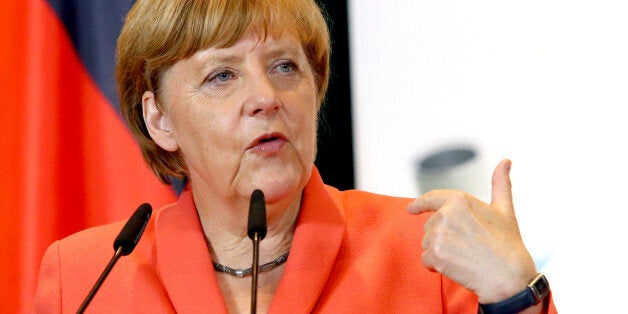 Visiting German Chancellor Angela Merkel speaks during a news conference after meeting with Albanian Prime Minister Edi Rama, on the first stop of the Balkan tour in Tirana Wednesday, July 8, 2015. Merkel has urged Albania to fulfill five categories presented by the European Union in December regarding its public administration and justice system ahead of launching full membership talks. Last year Albania was granted the candidate status. (AP Photo/Hektor Pustina)