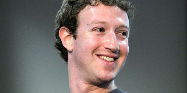 Facebook CEO Mark Zuckerberg smiles during a product announcement at Facebook headquarters in Palo Alto, Calif., Wednesday, Oct. 5, 2010. (AP Photo/Paul Sakuma)