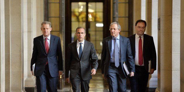 (Left to right) Spencer Dale, Governor Mark Carney, Jon Cunliffe and Andrew Bailey make their way to through the bank to deliver the Bank of England Financial Stability Report to reporters in London on June 26, 2014. The Bank of EnglanD launched measures aimed at cooling Britain's booming housing market, including a cap on lending for home loans. The bank's Financial Policy Committee (FPC) recommended that property loans of 4.5 times a borrower's income or higher should comprise no more than 15