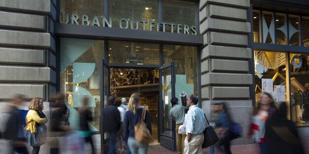 Pedestrians walk by an Urban Outfitters Inc. store in San Francisco, California, U.S., on Friday, Aug. 15, 2014. Urban Outfitters Inc. is scheduled to release earnings figures on Aug. 18. Photographer: David Paul Morris/Bloomberg via Getty Images