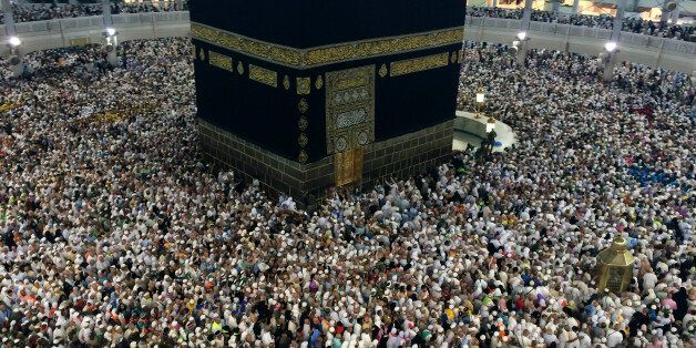 In this Tuesday, Oct. 7, 2014 photo, Muslim pilgrims circle the Kaaba, the black cube at center, inside the Grand Mosque during the annual pilgrimage, known as the hajj, in the Muslim holy city of Mecca, Saudi Arabia. More than 2 million pilgrims took part in the annual hajj pilgrimage this year. (AP Photo/Khalid Mohammed)