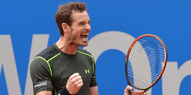 Britain's Andy Murray celebrates after winning the final match against Germany's Philipp Kohlschreiber at the BMW Open tennis tournament in Munich, Germany, Monday, May. 4, 2015. Murray won with 7-6, 5-7 and 7-6. (AP Photo/Kerstin Joensson)
