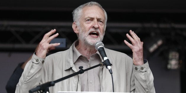 Labour MP Jeremy Corbyn speaks to protesters following a march against the British government's spending cuts and austerity measures in London on June 20, 2015. Thousands of demonstrators staged an anti-austerity march in London today, in the first major public protest since Conservative Prime Minister David Cameron won a general election.AFP PHOTO / JUSTIN TALLIS (Photo credit should read JUSTIN TALLIS/AFP/Getty Images)