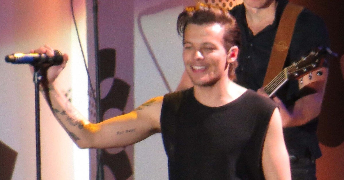 Louis Tomlinson Performs With One Direction After Baby Reports (PICS