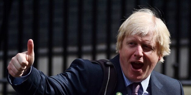 London Mayor and newly-elected Conservative member of parliament, Boris Johnson, gives a thumbs-up as he leaves arrives a meeting at 10 Downing Street in central London on May 11, 2015. Conservative Prime Minister David Cameron continued to appoint members of the government after a shock election victory in the May 7 general election. AFP PHOTO / BEN STANSALL (Photo credit should read BEN STANSALL/AFP/Getty Images)