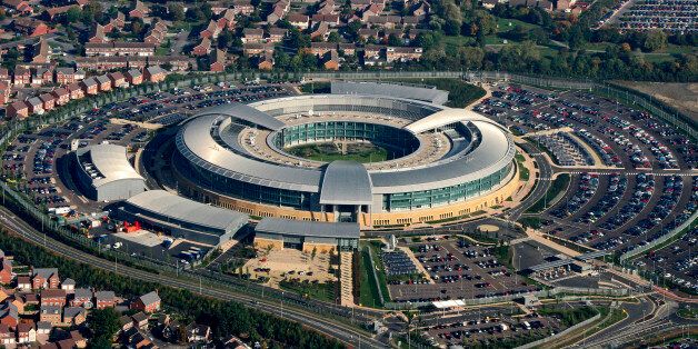 Amidst the houses and the car parks sits GCHQ the Government Communications Headquarters in this aerial photo taken on October 10, 2005. (Photo by David Goddard/Getty Images)