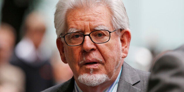 Veteran entertainer Rolf Harris leaves the Southwark Crown Court in London, Monday, June 30, 2014. A jury Monday found Australian-born Harris guilty of 12 counts of indecent assault.The 84-year-old was convicted of indecent assault on four victims aged 19 or under between 1968 and 1986. (AP Photo/Lefteris Pitarakis)