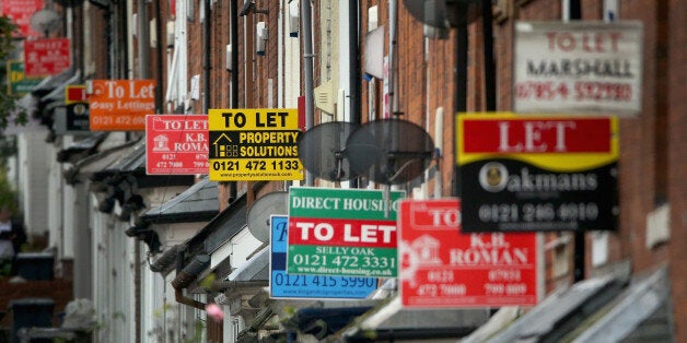 BIRMINGHAM, UNITED KINGDOM - OCTOBER 14: An array of To Let and For Sale signs protrude from houses in the Selly Oak area of Birmingham on October 14, 2014 in Birmingham, United Kingdom. The ONS (Office for National Statistics) have released details of it's findings showing the north-south divide in house prices is the biggest in history. Properties in the London area are nearly 3.5 times more expensive than homes in the north-east of England. (Photo by Christopher Furlong/Getty Images)