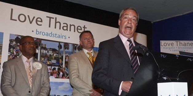 United Kingdom Independent Party (UKIP) leader Nigel Farage (R) speaks after he failed to be elected to the parliamentary seat of Thanet South in Margate, southeast England, on May 8, 2015 during the British general election. Farage announced his resignation as leader of the anti-EU UKIP after he failed to win a seat in Britain's parliament. AFP PHOTO / NIKLAS HALLE'N (Photo credit should read NIKLAS HALLE'N/AFP/Getty Images)