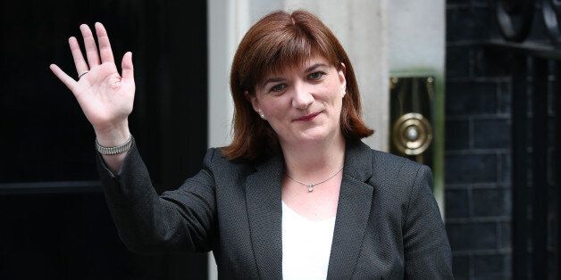 LONDON, ENGLAND - MAY 11: Nicky Morgan, who will continue as Secretary of State for Education, arrives at Downing Street on May 11, 2015 in London, England. Prime Minister David Cameron continued to announce his new cabinet with many ministers keeping their old positions. (Photo by Carl Court/Getty Images)