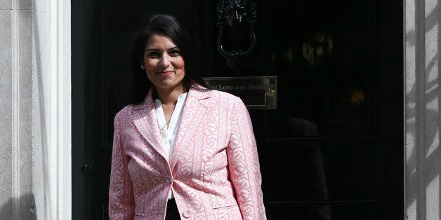 LONDON, ENGLAND - MAY 11: Priti Patel, the newly appointed employment minister, arrives at Downing Street on May 11, 2015 in London, England. Prime Minister David Cameron continued to announce his new cabinet with many ministers keeping their old positions. (Photo by Carl Court/Getty Images)