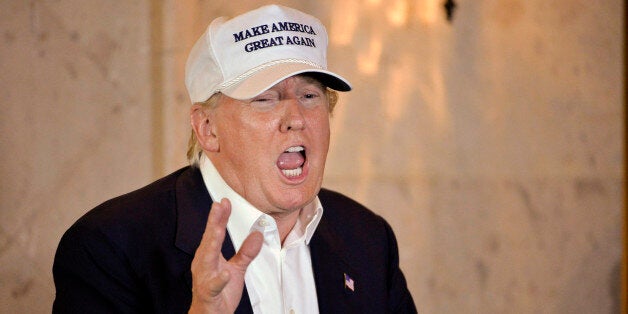 Republican presidential hopeful Donald Trump speaks during a brief stop at a campaign event in Laredo, Texas, Thursday, July 23, 2015. (AP Photo/Darren Abate)