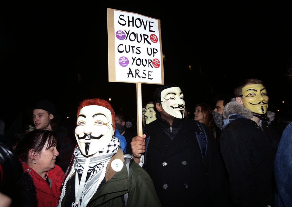 Masked Anonymous Protesters Aid Time Warner's Profits - The New York Times