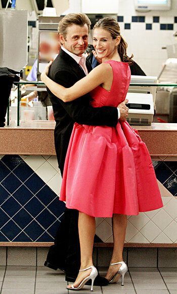 Only Carrie could get away with wearing a pink Oscar de la Renta gown to McDonalds