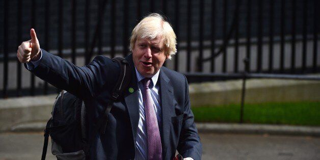London Mayor and newly-elected Conservative member of parliament, Boris Johnson, gives a thumbs-up as he leaves arrives a meeting at 10 Downing Street in central London on May 11, 2015. Conservative Prime Minister David Cameron continued to appoint members of the government after a shock election victory in the May 7 general election. AFP PHOTO / BEN STANSALL (Photo credit should read BEN STANSALL/AFP/Getty Images)