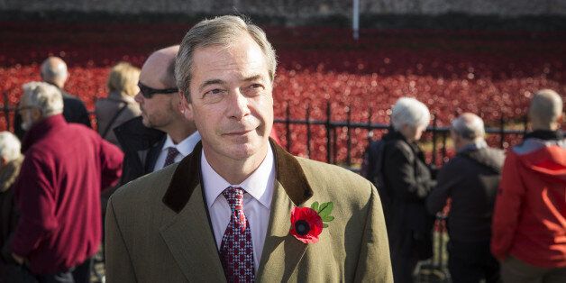 United Kingdom Independence Party (UKIP) leader, Nigel Farage, views the 'Blood Swept Lands and Seas of Red' installation at Tower of London on November 4, 2014 in London, England. 'Blood Swept Lands and Seas of Red' by artist Paul Cummins, made up of 888,246 ceramic poppies fills the moat of the Tower of London, to commemorate the First World War. Each ceramic poppy represents an allied victim of the First World War and the display is due to be completed by Armistice Day on November 11, 2014.