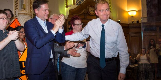 Tim Farron, pictured with Nick Clegg, speaks at Islington Assembly Hall, London, after being elected leader of the Liberal Democrat party. The former party president beat opponent Norman Lamb by 56.5\% to 43.5\% on a 56\% turnout in the contest to replace Nick Clegg.