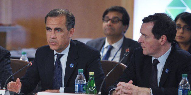 Bank of England Governor Mark Carney (L) speaks while watched by Britain's Chancellor of the Exchequer George Osborne (R) at a G20 ministerial meeting at the International Monetary Fund Headquarters on April 10, 2014 in Washington, DC. Carney paid tribute to former Canadian finance minister Jim Flaherty who died today. AFP PHOTO/Mandel NGAN (Photo credit should read MANDEL NGAN/AFP/Getty Images)