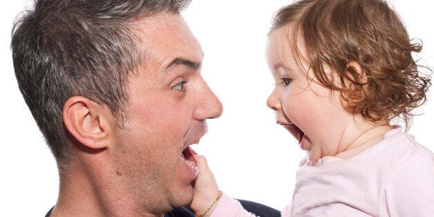 'Father and daughter have fun, isolate on white - (isolated over a white background)'