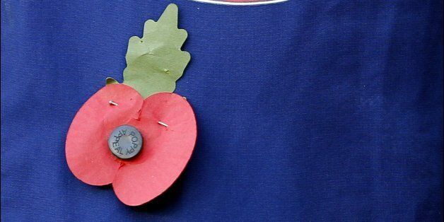 A poppy and the Sunderland club badge