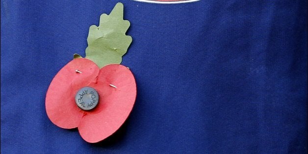 A poppy and the Sunderland club badge