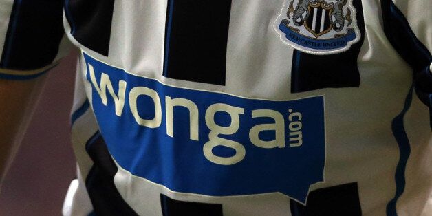 Wonga the shirt sponsor of Newcastle is displayed during the Pre Season Friendly match between Rangers and Newcastle United at Ibrox Stadium on August 06, 2013 in Glasgow, Scotland. (Photo by Ian MacNicol/Getty Images)