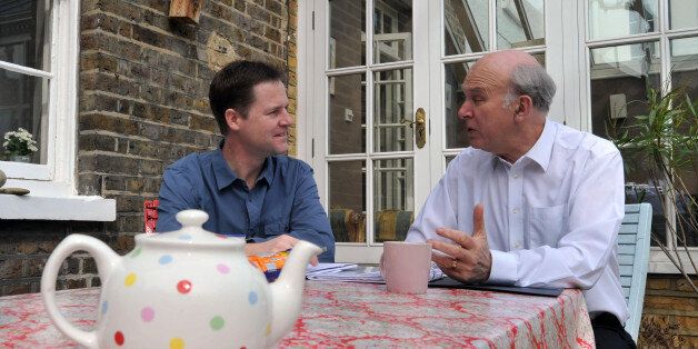 Liberal Democrats Party Leader Nick Clegg and Shadow Chancellor Vince Cable put the finishing touches to the party election manifesto at Mr Clegg's Putney home.