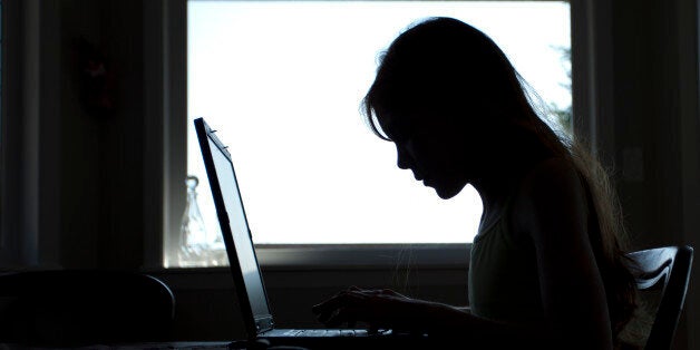 Girl working on a laptop computer