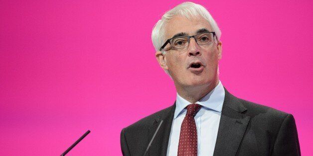 British Labour Party politician and 'Better Together' campaign leader Alistair Darling speaks to delegates during the Scotland Report in the main hall of Manchester Central, in Manchester on September 22, 2014 on the second day of the Labour Party conference. Britain's main opposition Labour Party was debating how to win next year's general election at its annual conference as it struggles to avoid divisions after Scotland's independence referendum. AFP PHOTO/LEON NEAL (Photo credit sh