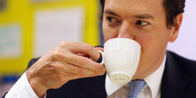 Chancellor of the Exchequer George Osborne enjoys a drink whilst he talks to parents, during a visit to a nursery in Hammersmith, London.