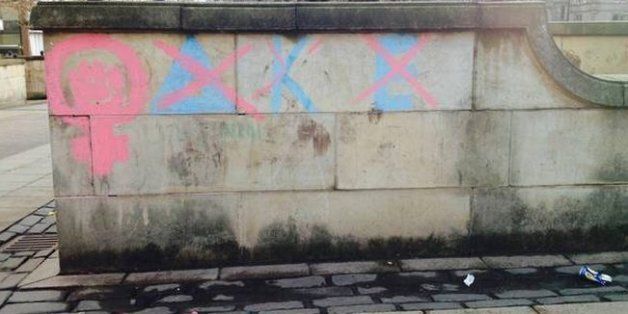 Graffiti of the fraternity’s Greek letters has also appeared intermittently in various public places