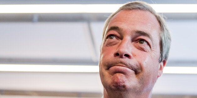 Britain's leader of the UKIP party Nigel Farage speaks with journalists in the press center at an EU summit in Brussels on Thursday, June 25, 2015. (AP Photo/Geert Vanden Wijngaert)