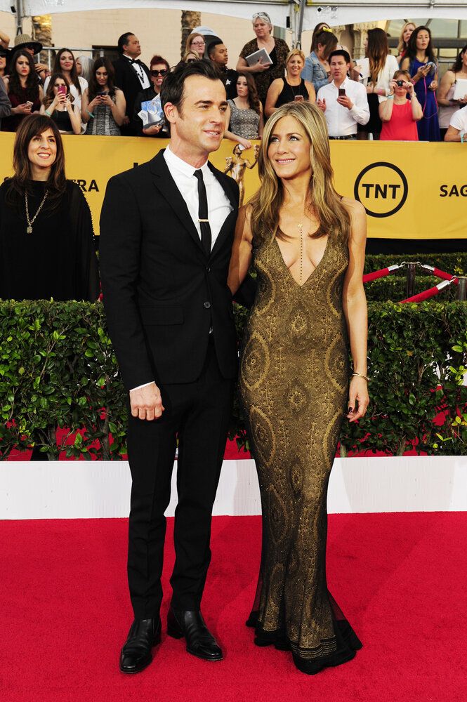 Happier than ever at the 21st Annual Screen Actors Guild Awards (major props to Jen for the body chain)