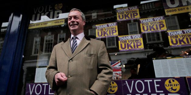 Nigel Farage, the leader of the U.K. Independence Party (UKIP) poses for the photographers in front of the party's offices in Rochester, England, Friday, Nov. 21, 2014, a day after a special election. UKIP, Britain's anti-immigration party, UKIP, has easily won its second seat in parliament as Mark Reckless, a former Conservative lawmaker ran well ahead of his old party. Reckless, the second Conservative to leave the party and win a seat for UKIP, won 42 percent of the vote in a special election in the Rochester & Strood constituency in southeast England. (AP Photo/Lefteris Pitarakis)