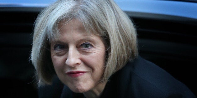 LONDON, ENGLAND - NOVEMBER 04: Home Secretary Theresa May arrives in Downing Street on November 4, 2014 in London, England. Liberal Democrat MP Norman Baker has resigned as a Home Office Minister saying that working in the Home Office was 'Like walking through mud'. (Photo by Peter Macdiarmid/Getty Images)