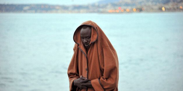 A migrant stands by the sea in Ventimiglia, at the Italian-French border, Tuesday, June 16, 2015. Police at Italy's Mediterranean border with France forcibly removed a few dozen African migrants who have been camping out for days in hopes of continuing their journeys farther north, a violent scene Italy is using to show that Europe needs to do something about the migrant crisis. (Luca Zennaro/ANSA via AP)