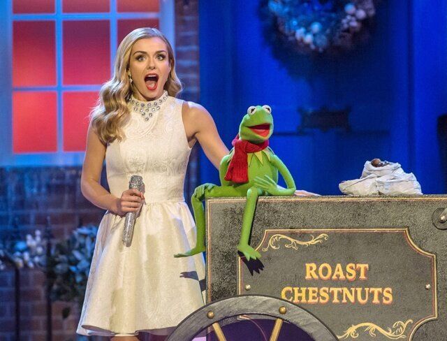 EDITORIAL USE ONLY. NO MERCHANDISING Mandatory Credit: Photo by REX (4320260ac) Katherine Jenkins with Kermit the Frog 'A Christmas Cracker' TV show, Hammersmith Apollo, London, Britain - 26 Dec 2014 Bradley Walsh will be getting everybody into the festive spirit as he hosts a Christmas extravaganza from The Hammersmith Apollo. The event is being tramsmitted on ITV at 8pm Friday 26th December 2014 - Boxing Day. He will be joined by one of the hottest bands in the UK, 'The Vamps', The Muppets will be flying in from America for a special festive appearance and Katherine Jenkins will add some sparkle to proceedings with a very special duet. There will be comedy from Al Murray, The Pub Landlord and the world renowned Cirque de Soleil will join with a show stopping routine. The cast of the hit West End musical, Irving Berlin's White Christmas will also be performing. There will also be games and Christmas giveaways galore. Get in the Christmas spirit and prepare for a night to remember