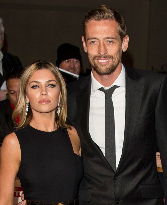 LONDON, ENGLAND - OCTOBER 06: Abbey Clancy and Peter Crouch attend the Pride of Britain awards at The Grosvenor House Hotel on October 6, 2014 in London, England. (Photo by Mark Cuthbert/UK Press via Getty Images)