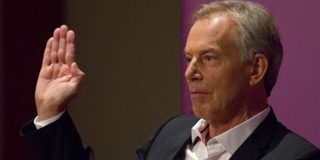 Britain's former Prime Minister and former Labour Party leader, Tony Blair, gestures as he speaks at an event attended by Labour supporters in central London on July 22, 2015. Blair weighed in on the leadership contest in Britain's opposition Labour party as a new poll electrified the race by putting leftwinger Jeremy Corbyn ahead. Blair, a moderniser who was Labour's longest-serving premier, urged the party to avoid tacking to the left if it is to recover from a crushing defeat in May's general election and win the next one in 2020. AFP PHOTO / JUSTIN TALLIS (Photo credit should read JUSTIN TALLIS/AFP/Getty Images)