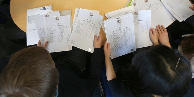 Pupils from Craigmount High School in Edinburgh open their Scottish Higher exam results.