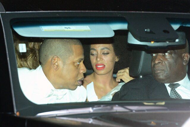 EXCLUSIVE Solange Knowles gets covered by sister Beyonce as they leave Solange's wedding reception party. Solange appears to have had some kind of allergic reaction as she was seen with large spots over her face and neck. Sister Beyonce moved very quickly to hide Solange's face in the back of the car as photographers took pictures of the new bride, 16 November 2014. 17 November 2014. Please byline: Vantagenews.co.uk