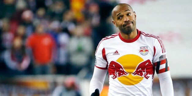 New York Red Bulls forward Thierry Henry gestures during the second half of the second soccer game of the MLS Eastern Conference final in Foxborough, Mass., Saturday, Nov. 29, 2014. The match ended 2-2 and New England advanced with a two-game aggregate 4-3. (AP Photo/Elise Amendola)