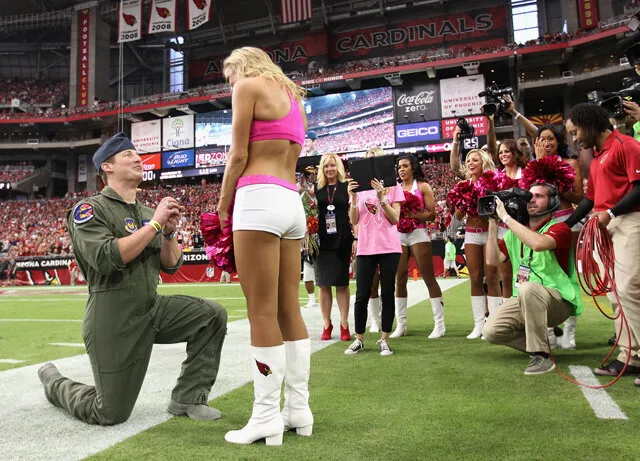 Air Force captain proposes to cheerleader during NFL game