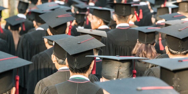 Back of graduates during commencement.