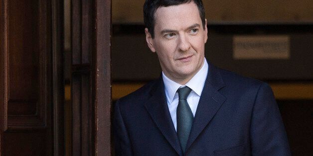 George Osborne, U.K. chancellor of the exchequer, leaves the HM Treasury building before heading to the Houses of Parliament to deliver his Autumn statement in London, U.K., on Wednesday, Dec. 3, 2014. Osborne will present his end-of-year outlook to Parliament today -- his last Autumn Statement before next year's general election. Photographer: Simon Dawson/Bloomberg via Getty Images