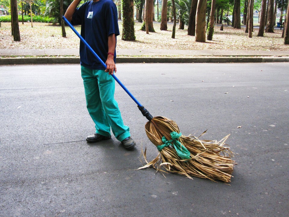 Broom made from fallen palm fronds 