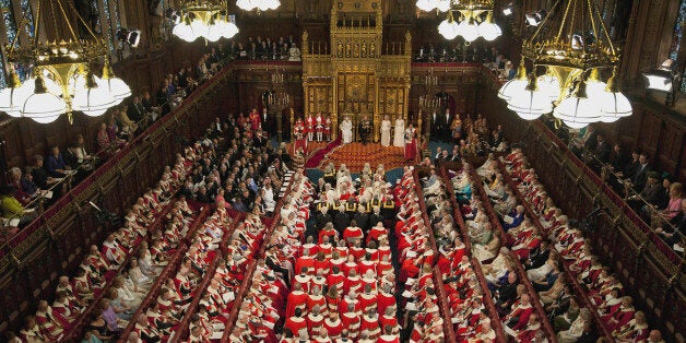 FILE This Wednesday, May 9, 2012 file photo shows Britain's Queen Elizabeth II seated beside Prince Philip in the House of Lords as she waits to read the Queen's Speech to lawmakers in London. Prime Minister David Cameron on Wednesday set out ambitious plans to replace Britain's 700-year-old House of Lords, the country's unelected upper chamber, with a smaller, mostly elected body _ taking on a task that has frustrated political leaders for decades. We have been discussing this issue for 100 years and it really is time to make progress, Cameron told legislators, hoping his government can succeed in stripping the country's non-elected elites of a legislative role which has its roots in the 11th Century. (AP Photo/Alastair Grant, Pool)