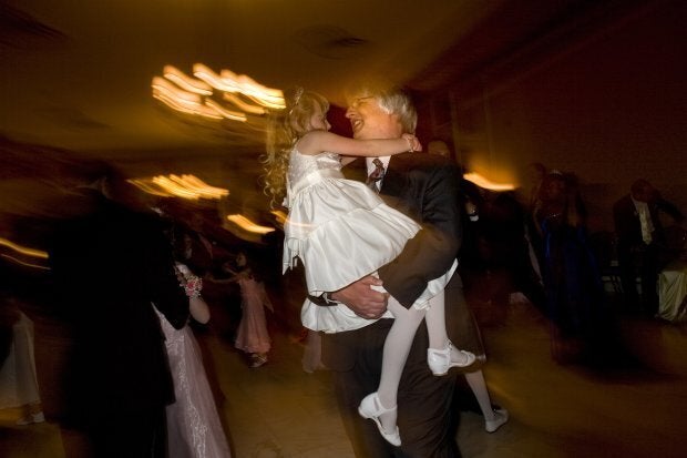 COLORADO SPRINGS, CO - MAY 16: Dave Lorrig dances with his daughter, SarahRose, 7, on May 16, 2008 in Colorado Springs, Colorado. The annual Father-Daughter Purity Ball, founded in 1998 by Randy and Lisa Wilson, focuses on the idea that a trustworthy and nurturing father will influence his daughter to lead a lifestyle of 'integrity and purity.' (Photo by Marvi Lacar/Getty Images)