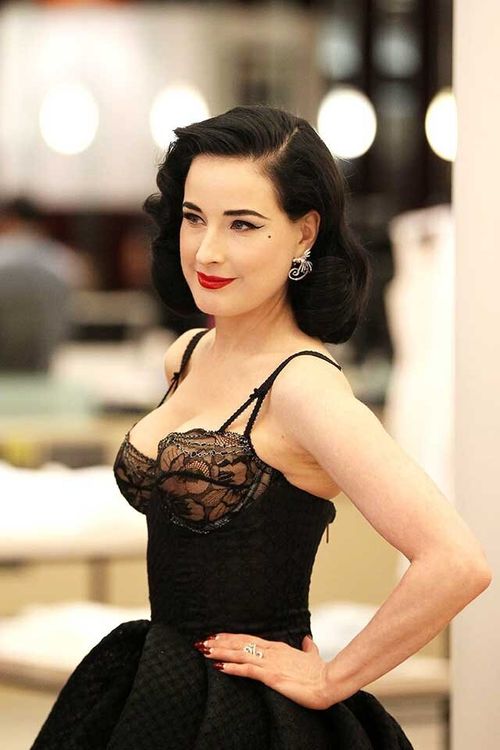 Dita Von Teese Lives Up To Her Sexy Siren Image As She Launches